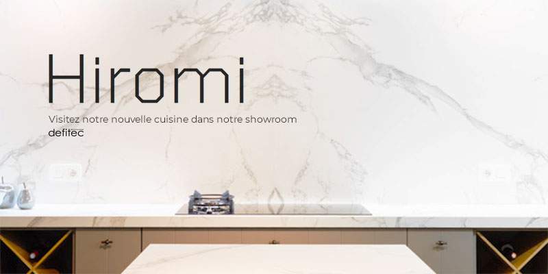 Découvrez cette cuisine équipée avec une jonction parfaite entre le plan de travail et la crédence en DEKTON imitant le marbre